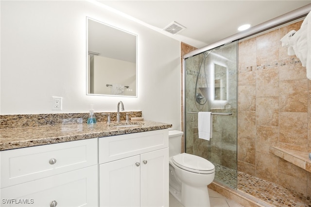 671 E Gulf Dr Unit 2C2, Sanibel, FL 33957 - bathroom with visible vents, toilet, a shower stall, vanity, and tile patterned flooring