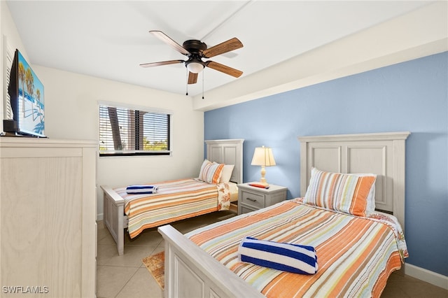671 E Gulf Dr Unit 2C2, Sanibel, FL 33957 - bedroom with baseboards, ceiling fan, and light tile patterned flooring