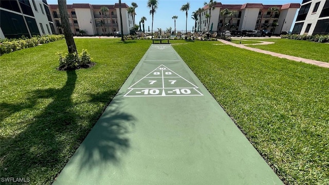 671 E Gulf Dr Unit 2C2, Sanibel, FL 33957 - view of property's community with shuffleboard and a lawn
