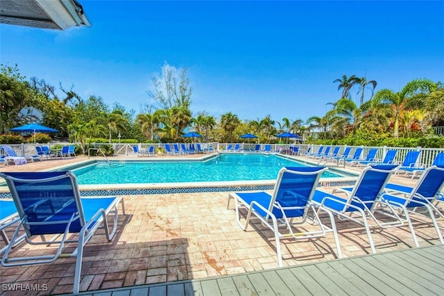 15123 Captiva Dr Unit 104, Captiva, FL 33924 - community pool featuring a patio and fence