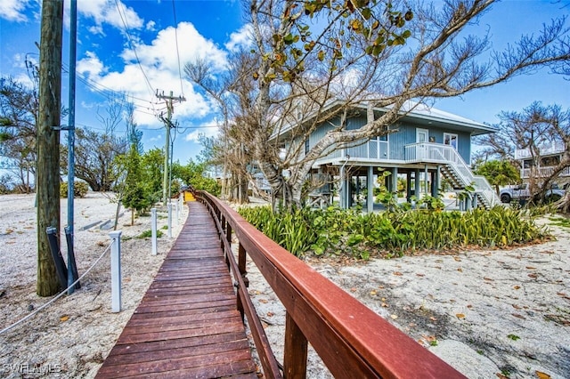 15123 Captiva Dr Unit 104, Captiva, FL 33924 - dock area featuring stairway