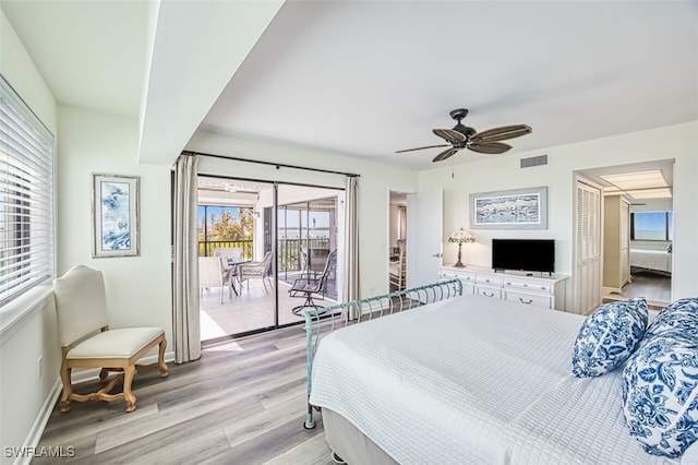 15123 Captiva Dr Unit 104, Captiva, FL 33924 - bedroom with access to outside, light wood-style floors, ceiling fan, visible vents, and baseboards