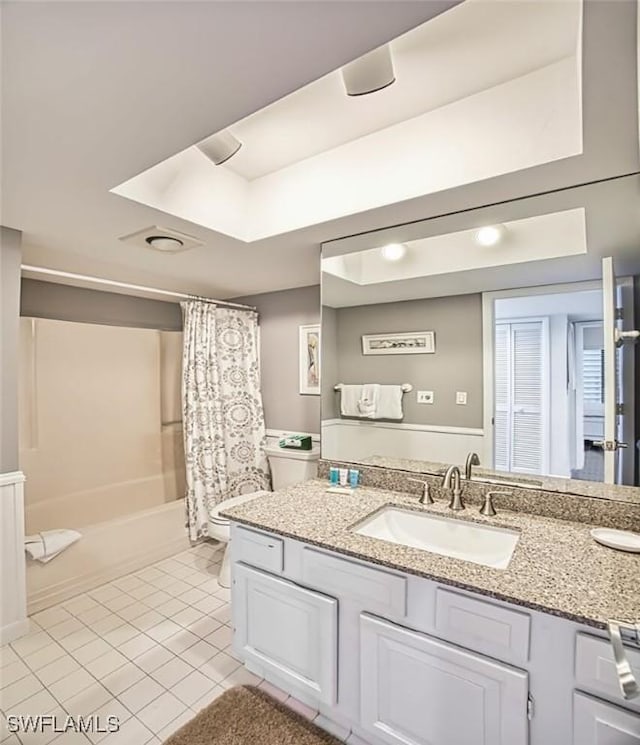15123 Captiva Dr Unit 104, Captiva, FL 33924 - full bathroom with tile patterned flooring, shower / tub combo, vanity, and toilet