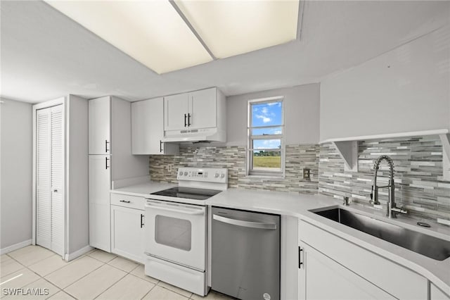 5032 Chiquita Blvd S Unit 101, Cape Coral, FL 33914 - kitchen with dishwasher, white electric range oven, under cabinet range hood, a sink, and decorative backsplash