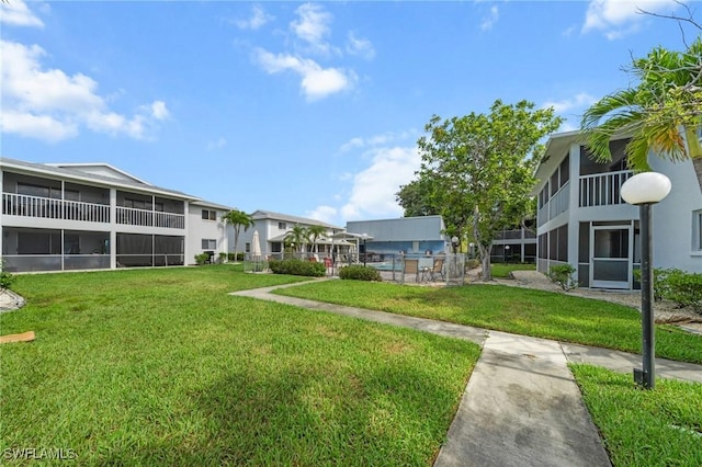 5032 Chiquita Blvd S Unit 101, Cape Coral, FL 33914 - surrounding community with a yard