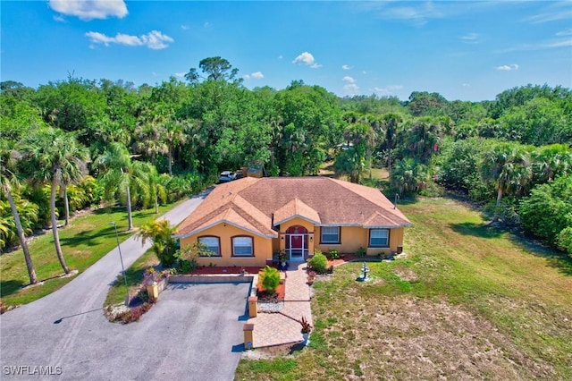 aerial view with a wooded view