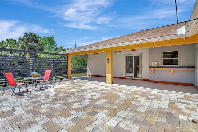 view of patio / terrace with fence