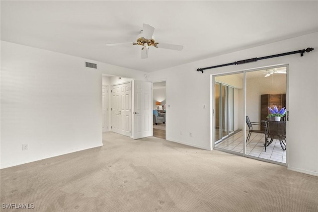 unfurnished bedroom with visible vents, baseboards, and carpet flooring