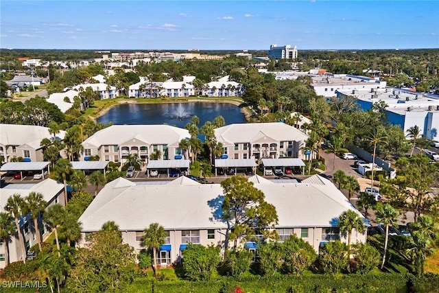 bird's eye view with a water view and a residential view