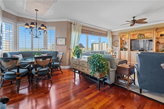8787 Bay Colony Dr Unit 803, Naples, FL 34108 - living room with wood finished floors, plenty of natural light, a ceiling fan, crown molding, and a chandelier