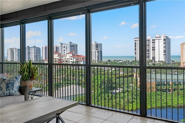 8787 Bay Colony Dr Unit 803, Naples, FL 34108 - sunroom with a view of city and a water view