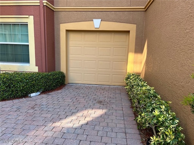 15585 Ocean Walk Cir Unit 207, Fort Myers, FL 33908 - garage with decorative driveway