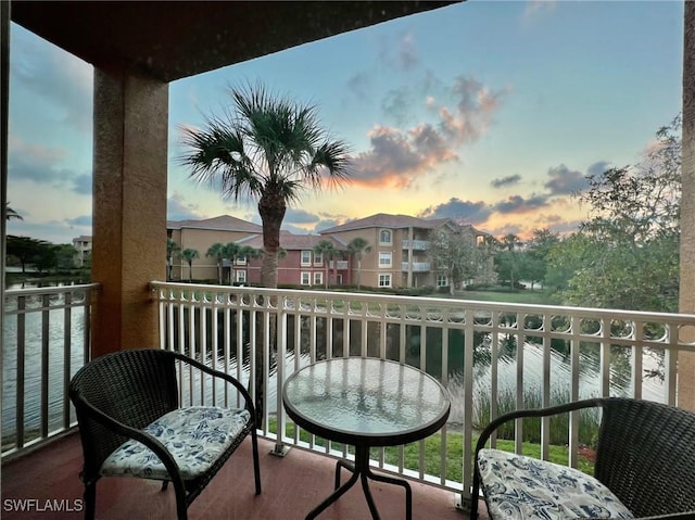 view of balcony at dusk