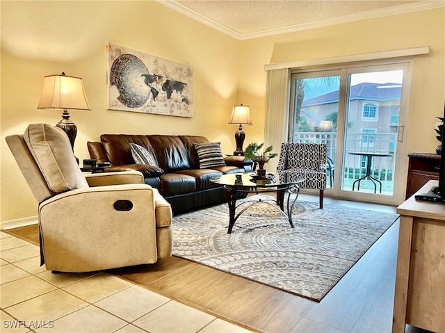 living area featuring light tile patterned floors, crown molding, and a textured ceiling