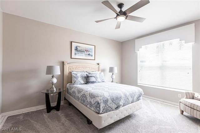 14500 Daffodil Dr Unit 1102, Fort Myers, FL 33919 - bedroom featuring carpet flooring, baseboards, and a ceiling fan