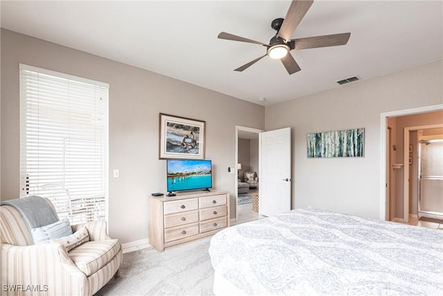 14500 Daffodil Dr Unit 1102, Fort Myers, FL 33919 - bedroom featuring light carpet, baseboards, and ceiling fan