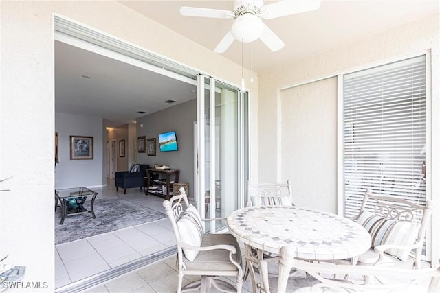 14500 Daffodil Dr Unit 1102, Fort Myers, FL 33919 - view of patio featuring ceiling fan