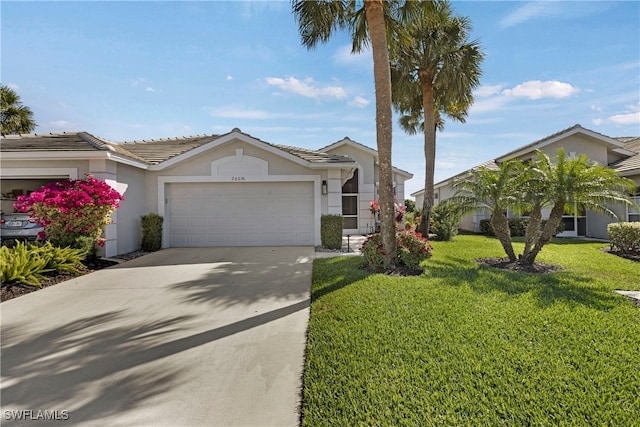 26036 Clarkston Dr, Bonita Springs, FL 34135 - view of front of home featuring a garage, stucco siding, a front lawn, concrete driveway, and a tiled roof
