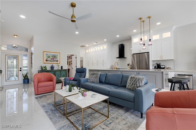 26036 Clarkston Dr, Bonita Springs, FL 34135 - living area with ceiling fan, recessed lighting, and light marble finish flooring