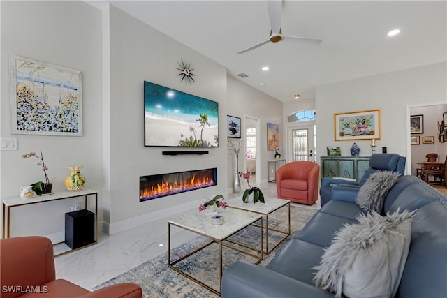 26036 Clarkston Dr, Bonita Springs, FL 34135 - living room featuring recessed lighting, a glass covered fireplace, marble finish floors, and ceiling fan