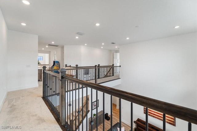4151 Traditions Dr, Ave Maria, FL 34142 - corridor featuring visible vents, baseboards, an upstairs landing, and recessed lighting