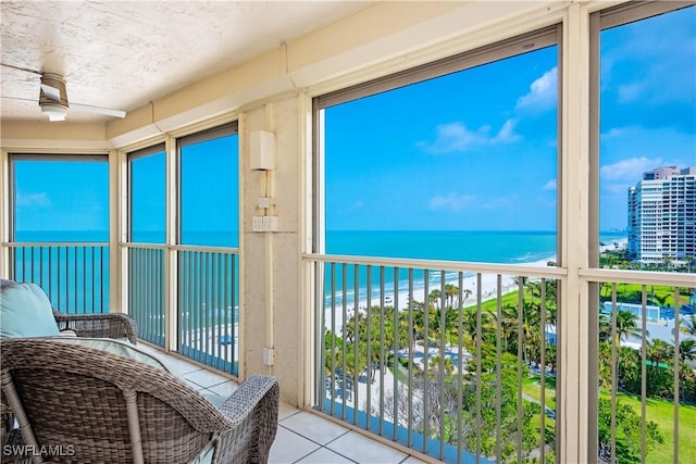 sunroom with a water view