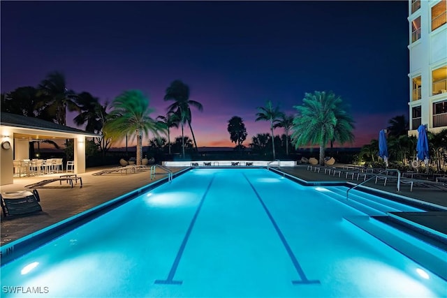 community pool with a patio area
