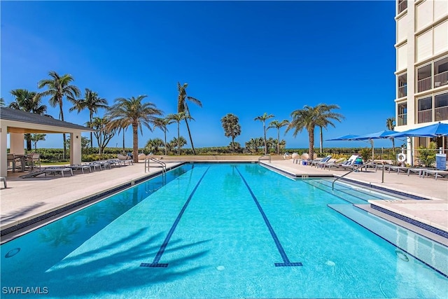 community pool with a patio