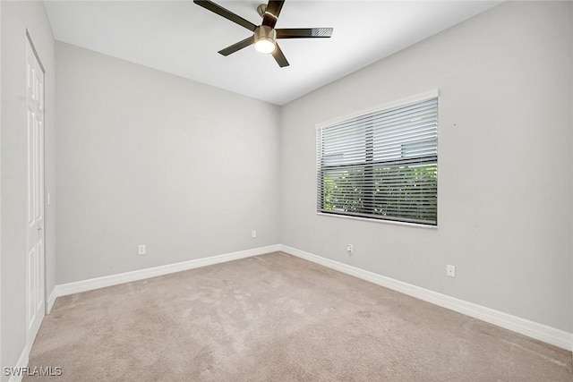 11643 Riverstone Ln, Fort Myers, FL 33913 - spare room featuring ceiling fan, baseboards, and carpet