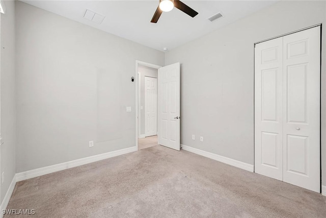 11643 Riverstone Ln, Fort Myers, FL 33913 - unfurnished bedroom featuring a closet, baseboards, carpet flooring, a ceiling fan, and visible vents