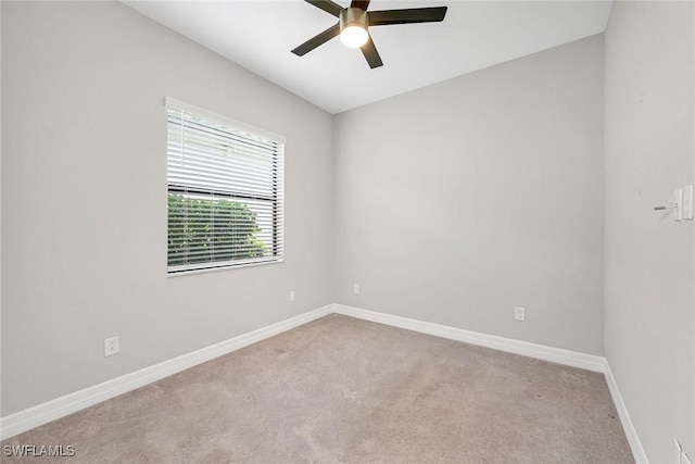 11643 Riverstone Ln, Fort Myers, FL 33913 - carpeted spare room with baseboards and a ceiling fan