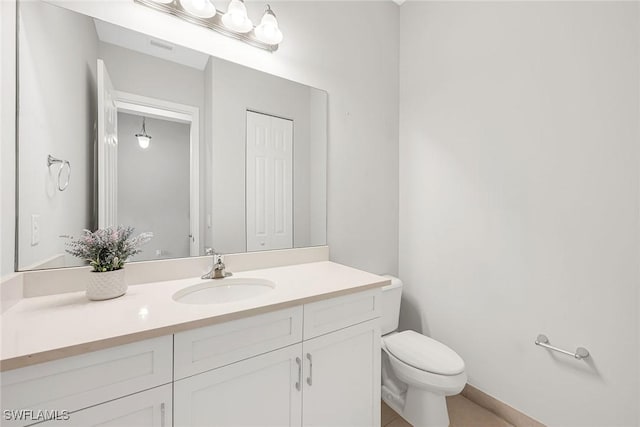 11643 Riverstone Ln, Fort Myers, FL 33913 - bathroom featuring tile patterned flooring, vanity, and toilet