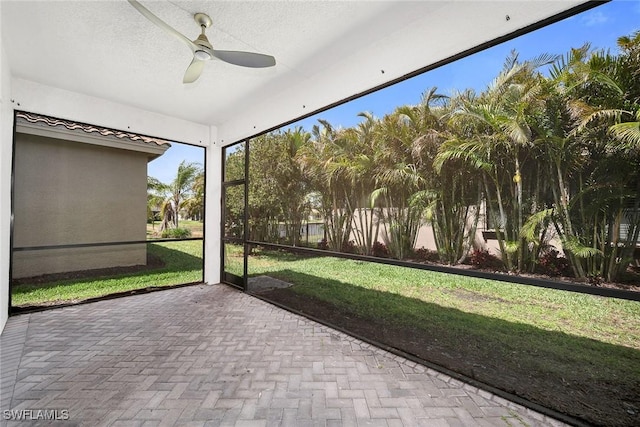 11643 Riverstone Ln, Fort Myers, FL 33913 - unfurnished sunroom featuring a ceiling fan