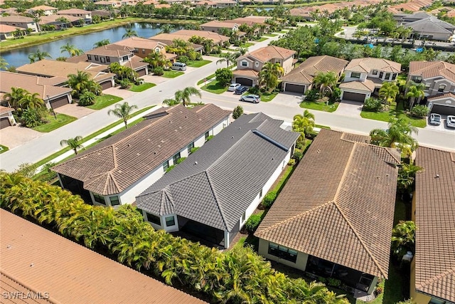 11643 Riverstone Ln, Fort Myers, FL 33913 - drone / aerial view featuring a water view and a residential view