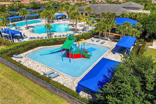 11643 Riverstone Ln, Fort Myers, FL 33913 - exterior space featuring fence, a water play area, and a lawn