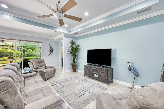 12740 Seaside Key Ct, North Fort Myers, FL 33903 - living room with ceiling fan, crown molding, recessed lighting, a tray ceiling, and tile patterned flooring