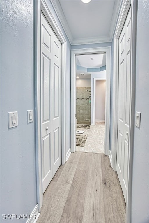 12740 Seaside Key Ct, North Fort Myers, FL 33903 - hall with light wood-type flooring and ornamental molding