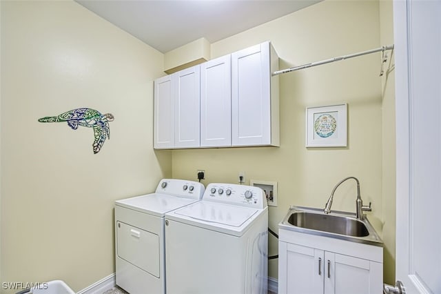 12740 Seaside Key Ct, North Fort Myers, FL 33903 - washroom featuring washing machine and clothes dryer and cabinet space