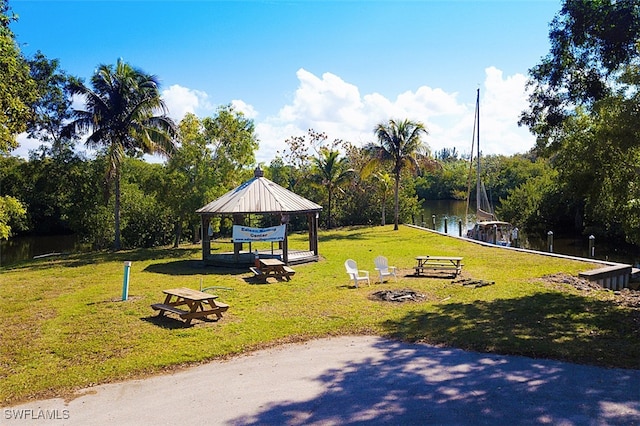 12740 Seaside Key Ct, North Fort Myers, FL 33903 - view of home's community featuring a gazebo, a lawn, and view of scattered trees