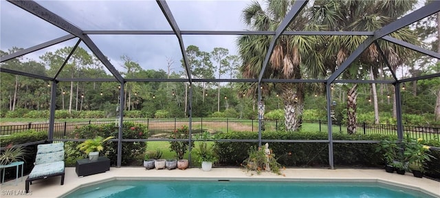 3268 Aralia Ct E, Alva, FL 33920 - view of pool with a fenced backyard and glass enclosure