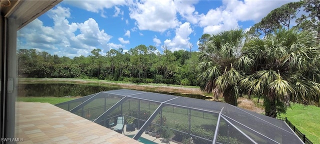 3268 Aralia Ct E, Alva, FL 33920 - dock area with glass enclosure and a patio