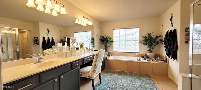 3268 Aralia Ct E, Alva, FL 33920 - bathroom featuring tile patterned floors, healthy amount of natural light, vanity, and a garden tub