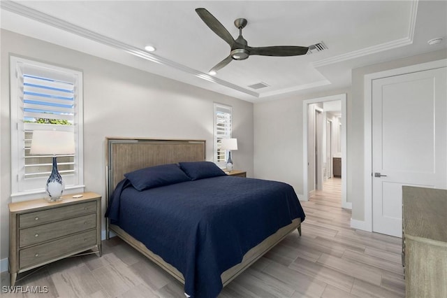 641 Diplomat Ct, Marco Island, FL 34145 - bedroom with baseboards, multiple windows, ceiling fan, and light wood-style floors