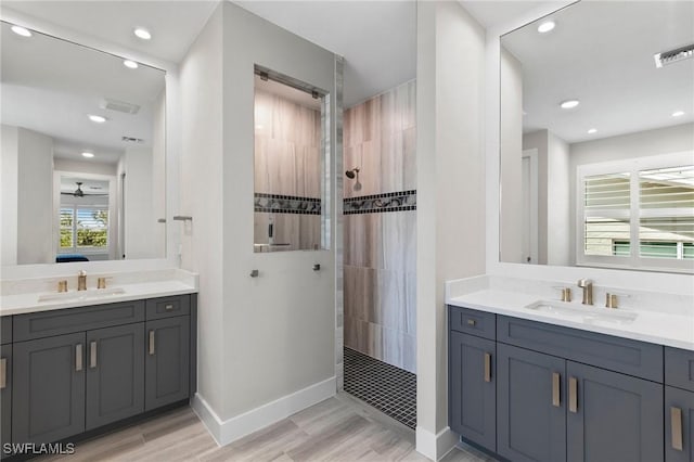 641 Diplomat Ct, Marco Island, FL 34145 - full bath featuring two vanities, a sink, visible vents, and walk in shower