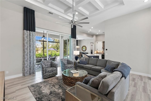 641 Diplomat Ct, Marco Island, FL 34145 - living area featuring coffered ceiling, a high ceiling, baseboards, and a ceiling fan