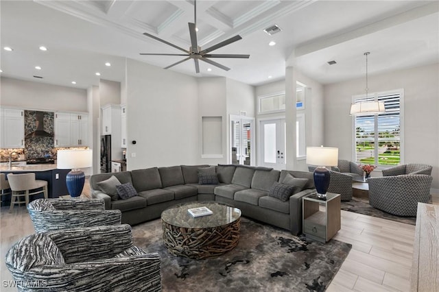 641 Diplomat Ct, Marco Island, FL 34145 - living area featuring ceiling fan, visible vents, recessed lighting, a high ceiling, and coffered ceiling