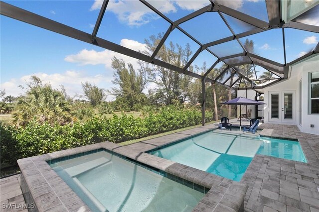 641 Diplomat Ct, Marco Island, FL 34145 - view of pool with french doors, a pool with connected hot tub, and a patio