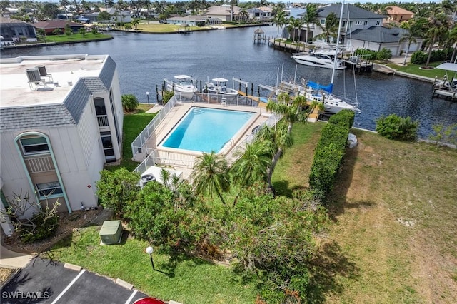 aerial view with a water view and a residential view