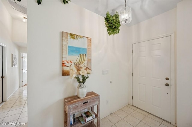 20902 Blacksmith Frg, Estero, FL 33928 - entryway featuring light tile patterned flooring