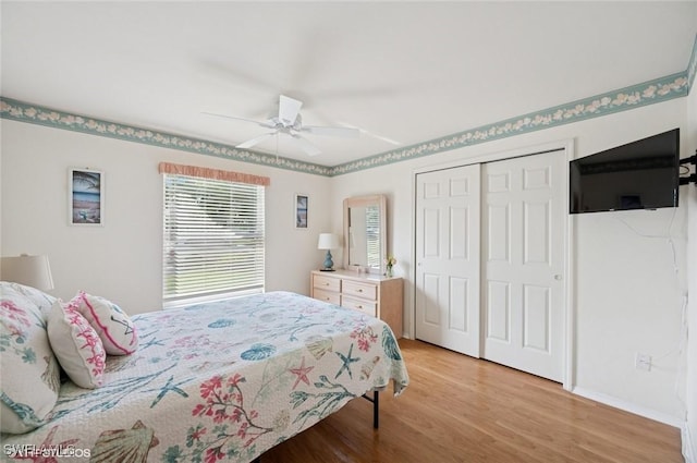 20902 Blacksmith Frg, Estero, FL 33928 - bedroom featuring light wood-type flooring, a closet, ceiling fan, and baseboards
